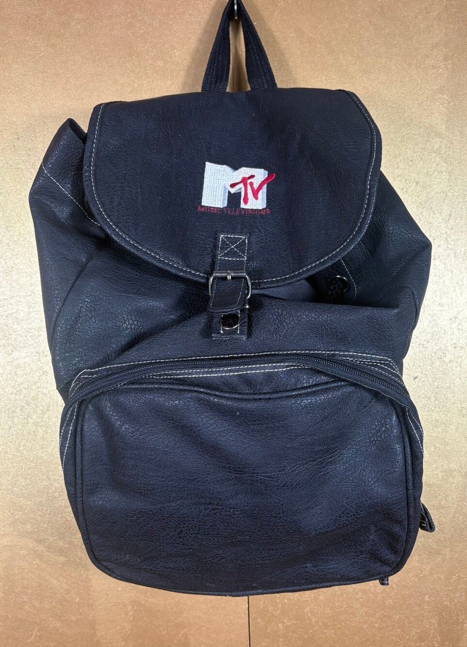MTV embroidered vintage leather backpack